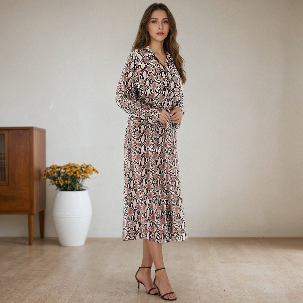 Women’s sheath dress with snake motif and long sleeve Caloria