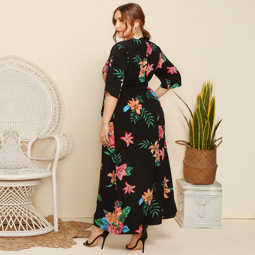 Women's maxi dress with floral design and waist belt Caloria